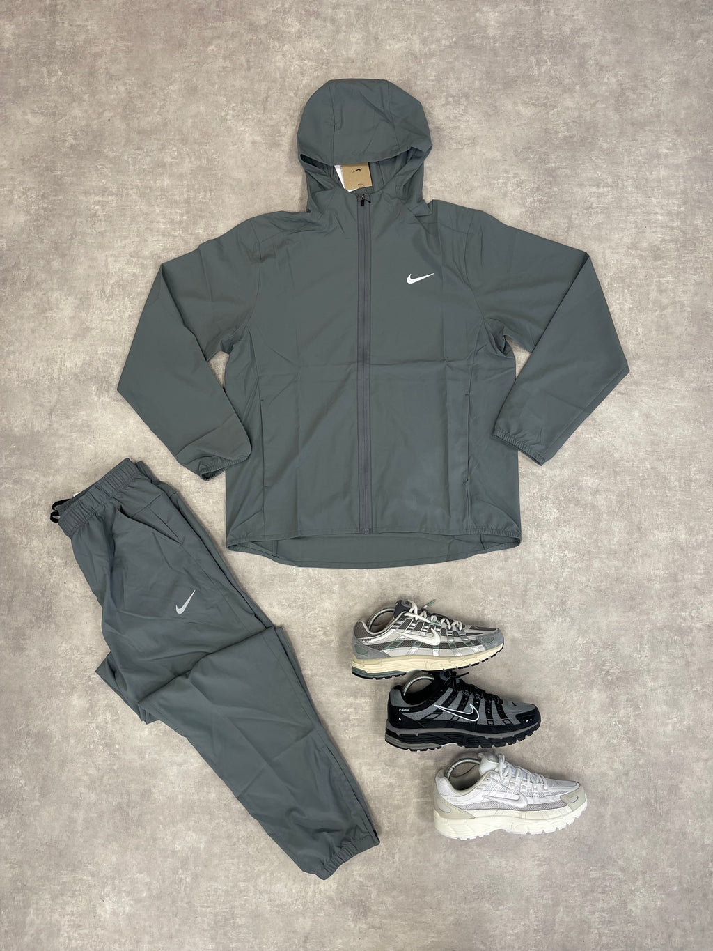 NIKE DRI FIT ZIP UP WINDBREAKER -GREY